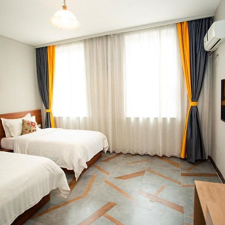 Ou Lu Business Hotel Циндао Екстериор снимка