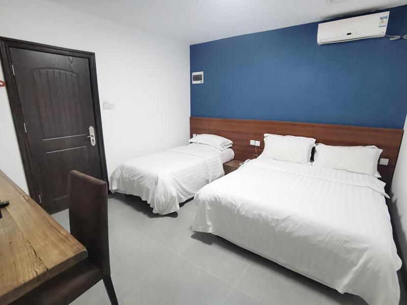Ou Lu Business Hotel Циндао Екстериор снимка