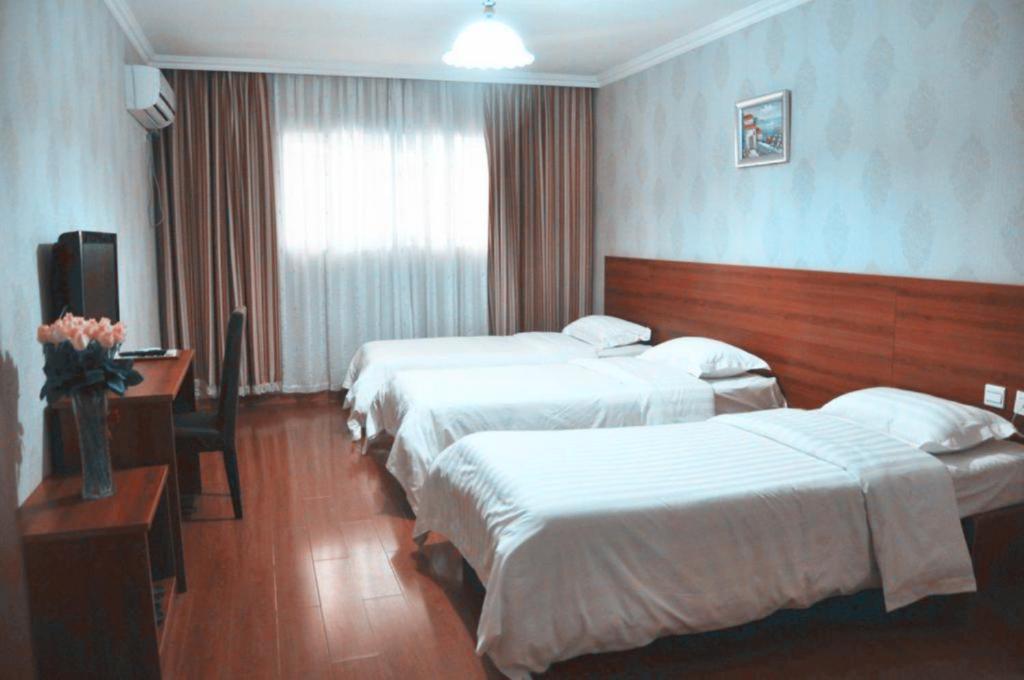 Ou Lu Business Hotel Циндао Екстериор снимка