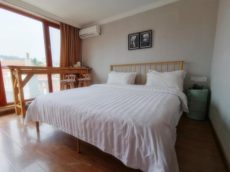 Ou Lu Business Hotel Циндао Екстериор снимка